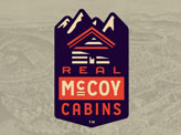Real Mccoy Cabins Emblem