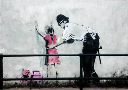 Macintosh HD:Users:brittanyloeffler:Downloads:Upwork:Banksy:Banksy-Policeman-Searching-Girl.jpg